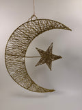 Hanging moon and star. Gold glitter metal frame. This decorative piece can elevate your home during Eid to give you a festive feel.